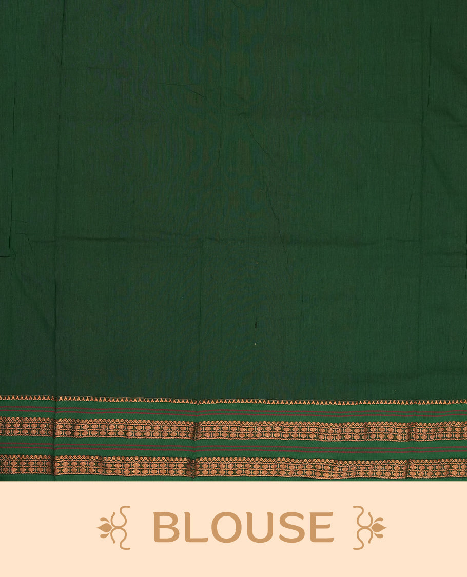 Mustard yellow Kalayani cotton saree with delicate woven motifs on the body, enhanced by a rich green zari border and pallu with traditional patterns, paired with a matching blouse piece.