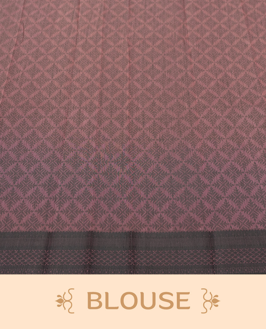 Mauve colour silk cotton saree featuring elegant floral zari motifs on the body, complemented by a rich contrast dark border and pallu with traditional woven detailing & Comes with a matching blouse piece.
