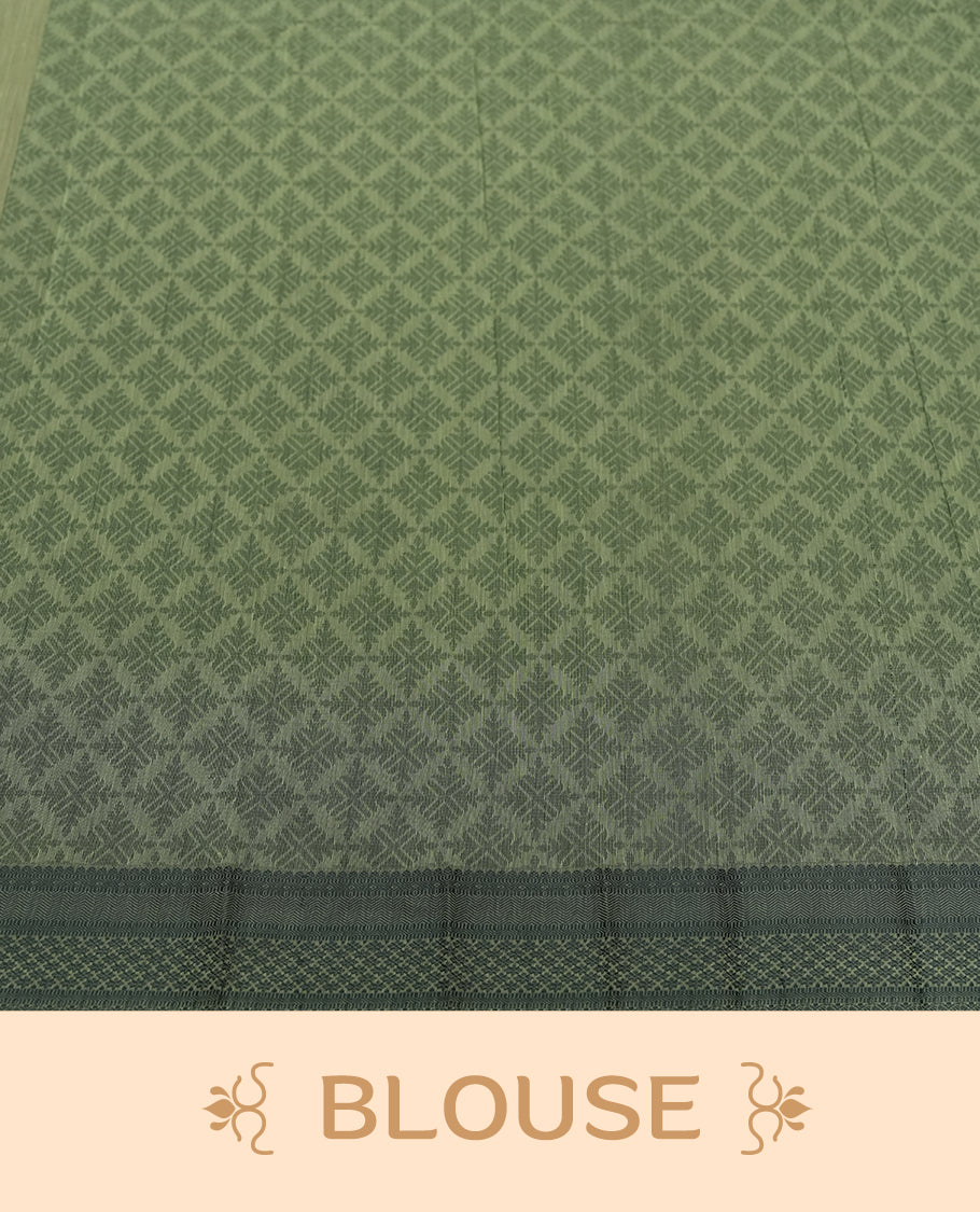 Pastel green colour silk cotton saree featuring elegant floral zari motifs on the body, complemented by a rich contrast dark green border and pallu with traditional woven detailing & Comes with a matching blouse piece.