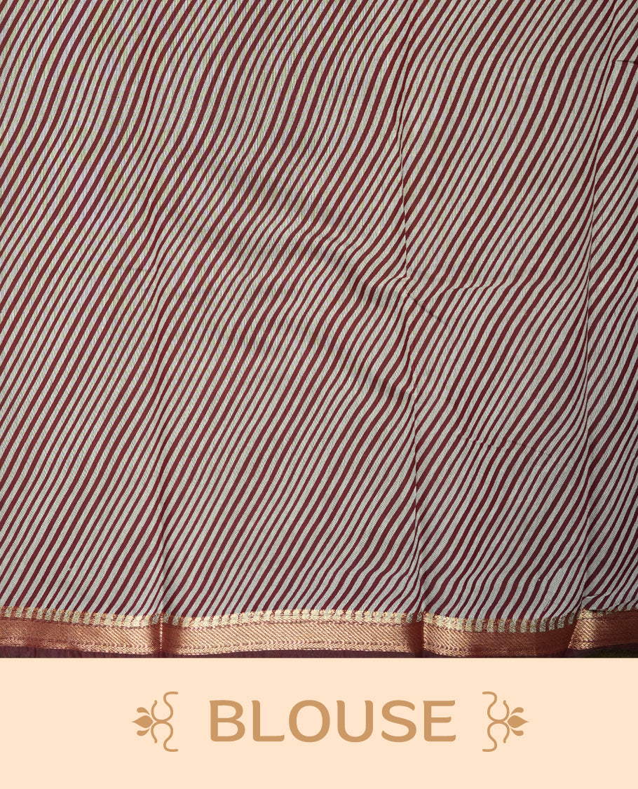 Teal blue colour mixed chanderi cotton saree with plain body, multicolor striped and geometric pallu with triangle patterns, maroon and golden zari border, and matching maroon blouse.