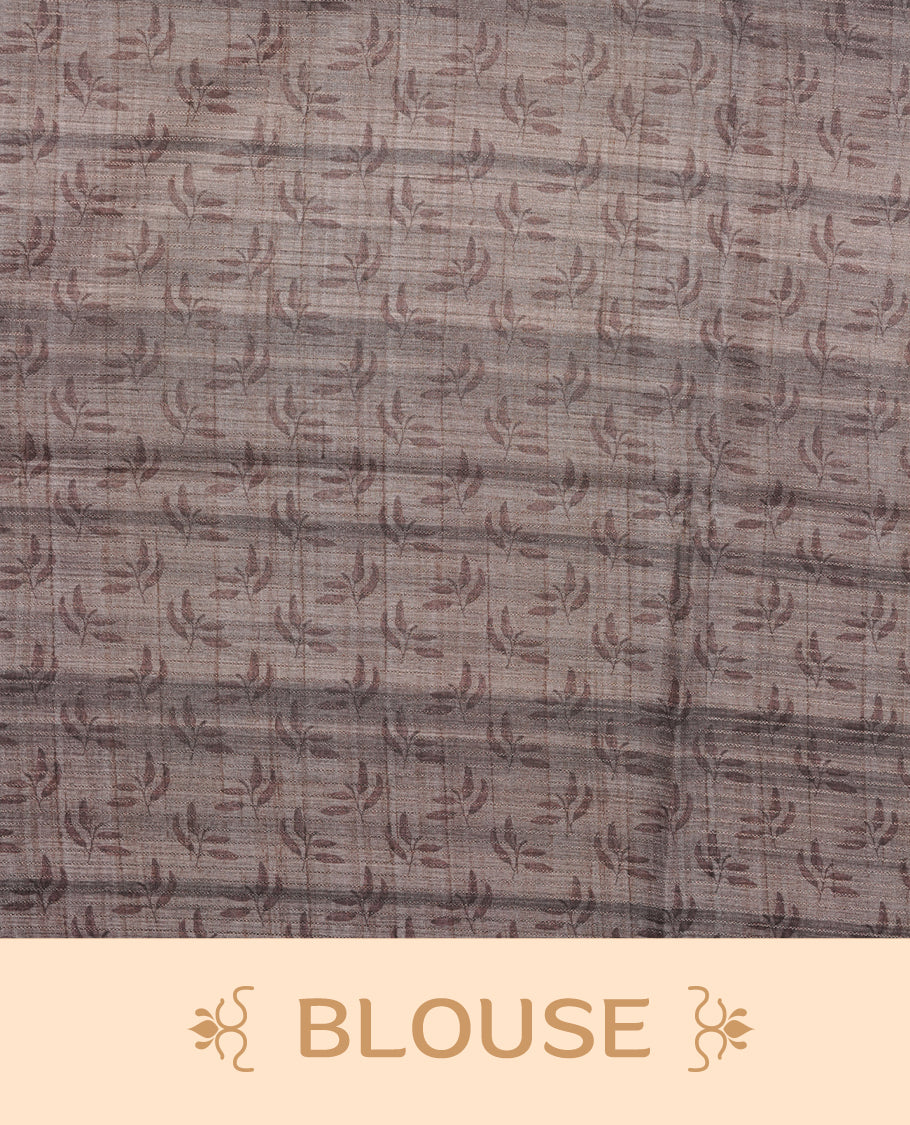 Blue grey colour semi tussar silk saree featuring floral print across body, contrast dark blue colour border and pallu, paired with matching blouse piece.