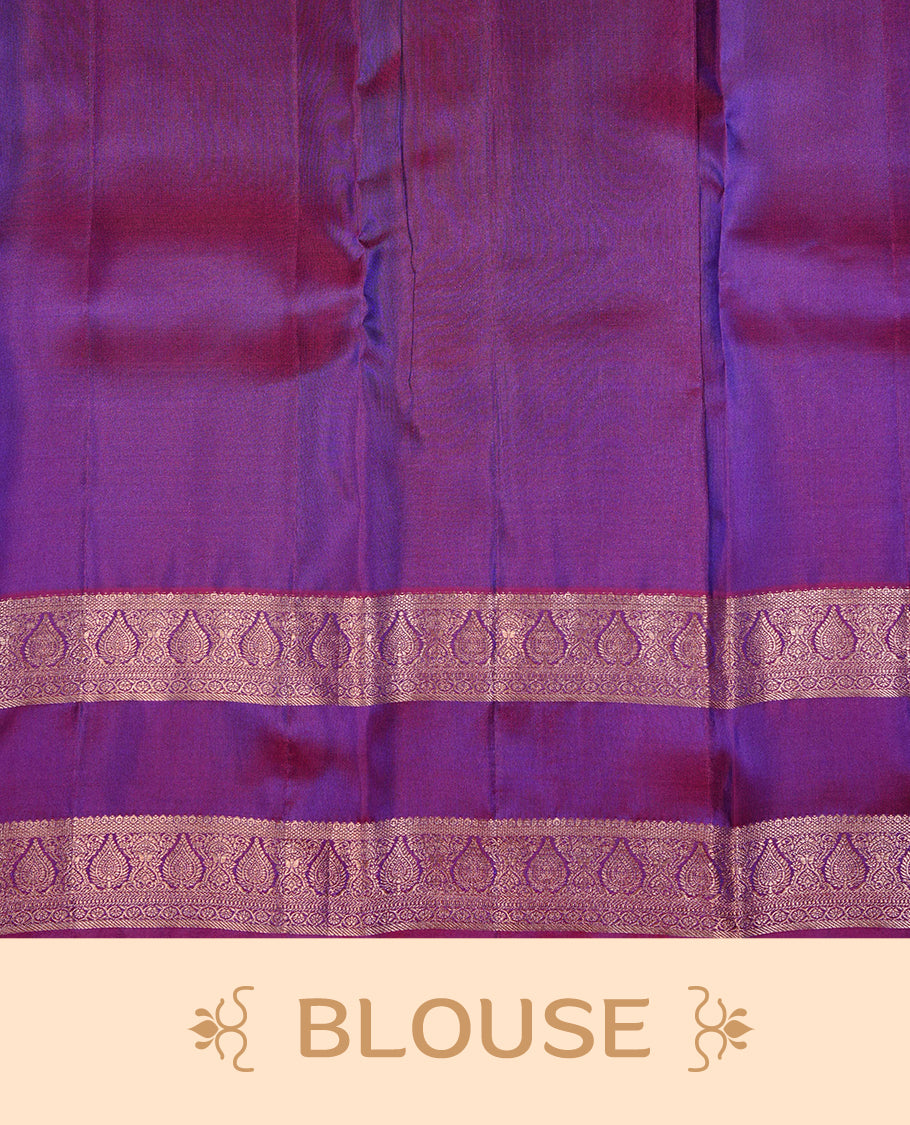Green & Blue Dual Colour Traditional Kancheepuram Slik Saree Featuring Gold Zari Motifs on the Body, Complemented by a Contrast Purple Colour Gold Zari Traditional Border and Pallu, Paired with a Matching Blouse .