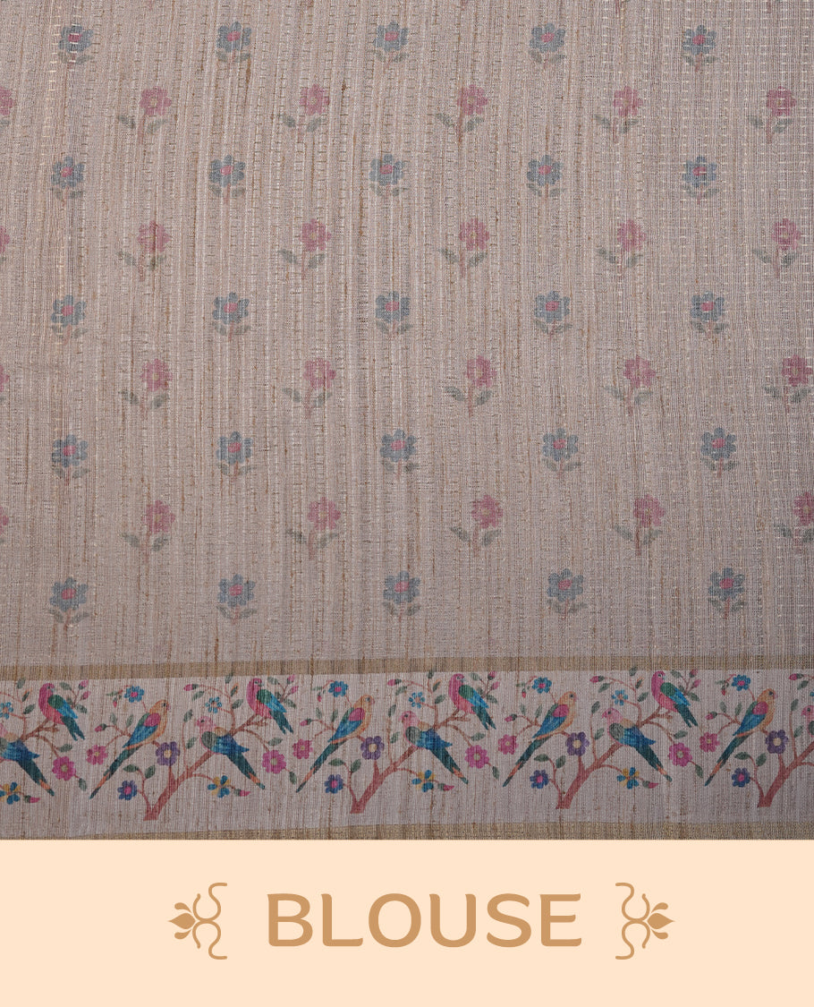 Teal colour tussar saree featuring golden zari dot stripped pattern on the body, complemented by a contrast cream colour mutlicolour floral kodi & animal print on border & pallu, paired with a matching blouse.