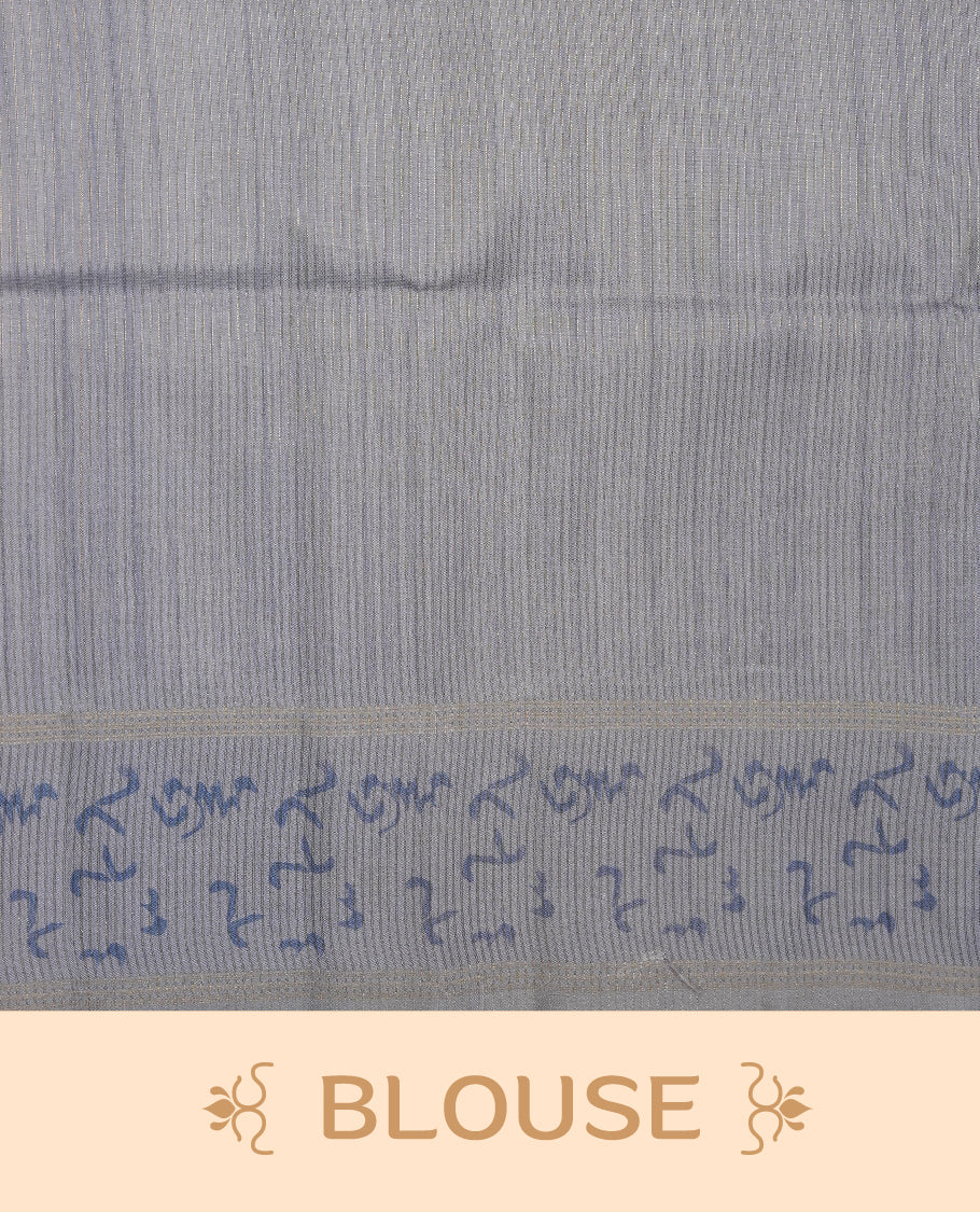 Steel blue colour semi tusser silk saree featuring geometric print pattern across body, gold zari border with style motifs and paired with matching blouse.