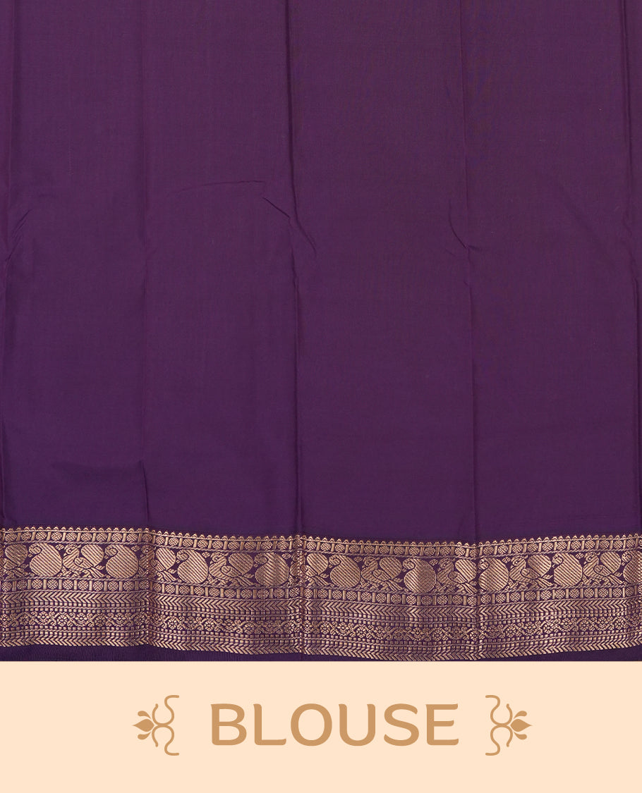 Teal Blue Colour Semi Silk Saree with Golden Peacock Butta Motifs, Contrasting Purple Golden Zari Pallu & Border, Traditional Leaf Designs, and Matching Blouse Piece