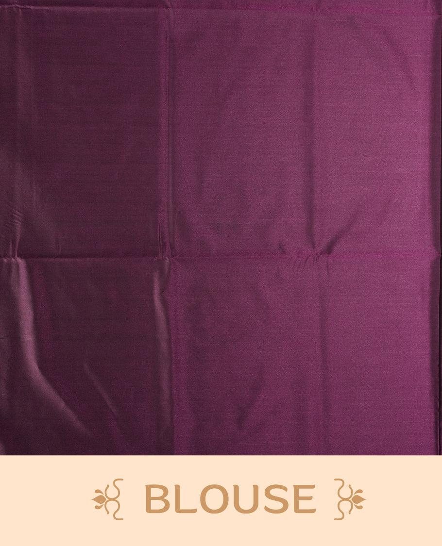 Grape colour semi soft silk saree, adorned with subtle self woven motifs on the body & The design is elevated with an elegant zari border and pallu, paired with a matching blouse.