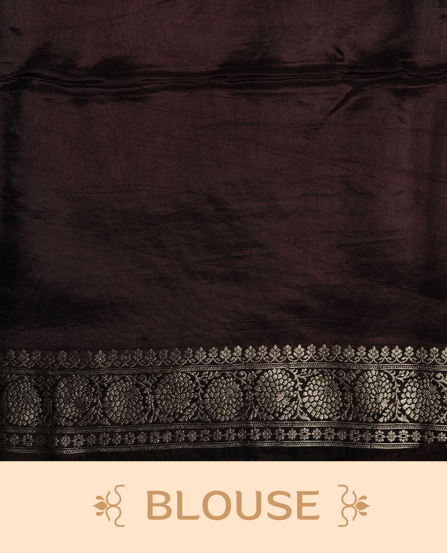 Chocolate colour banaras crepe saree featuring gold & silver zari design stripes on body, complemented by self colour border, paired with matching blouse piece.