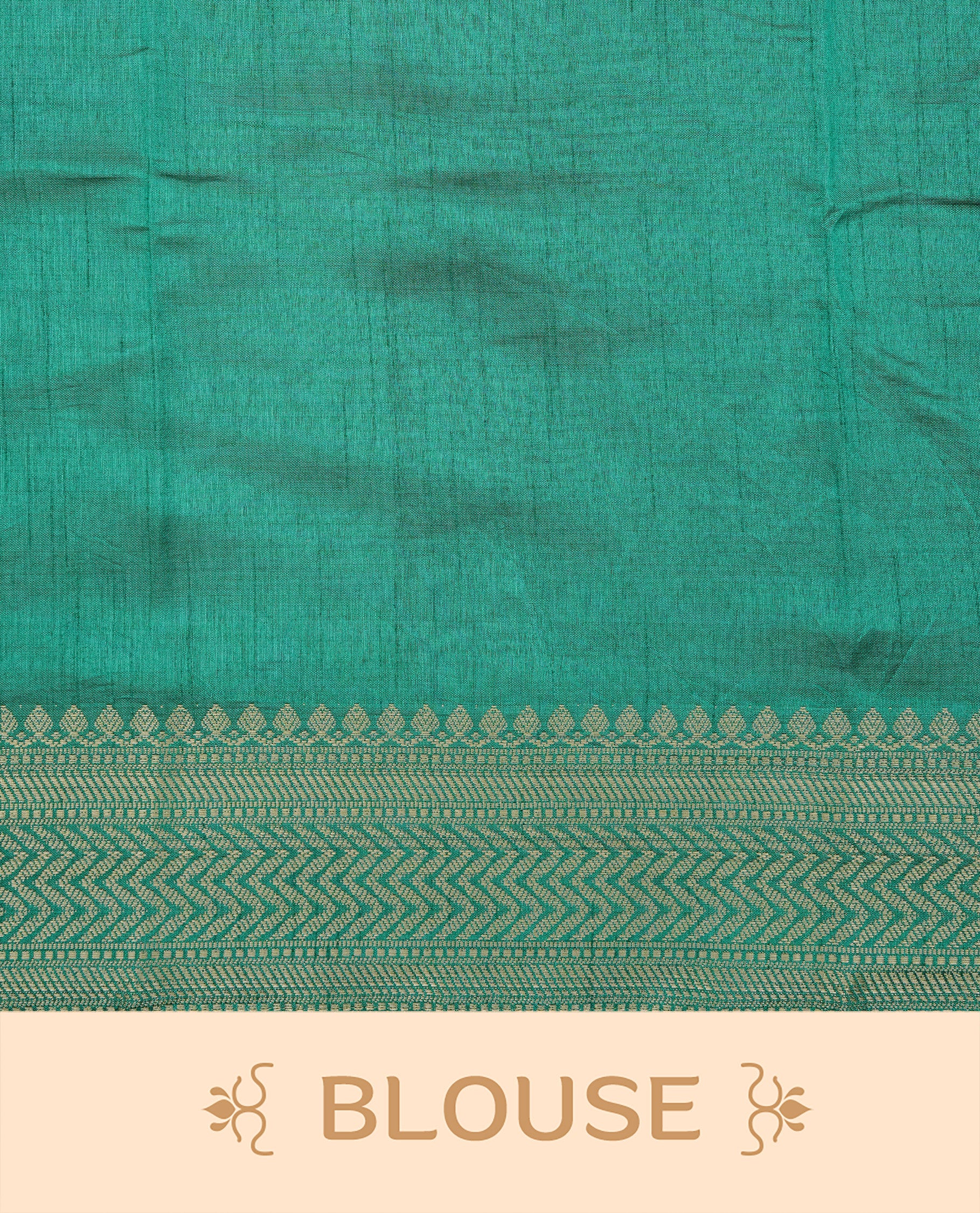 Cream colour Semi Tussar silk saree featuring an elegant plain body, accentuated by a contrast Green border adorned with intricate gold zigzag zari work, paired with a matching blouse piece.