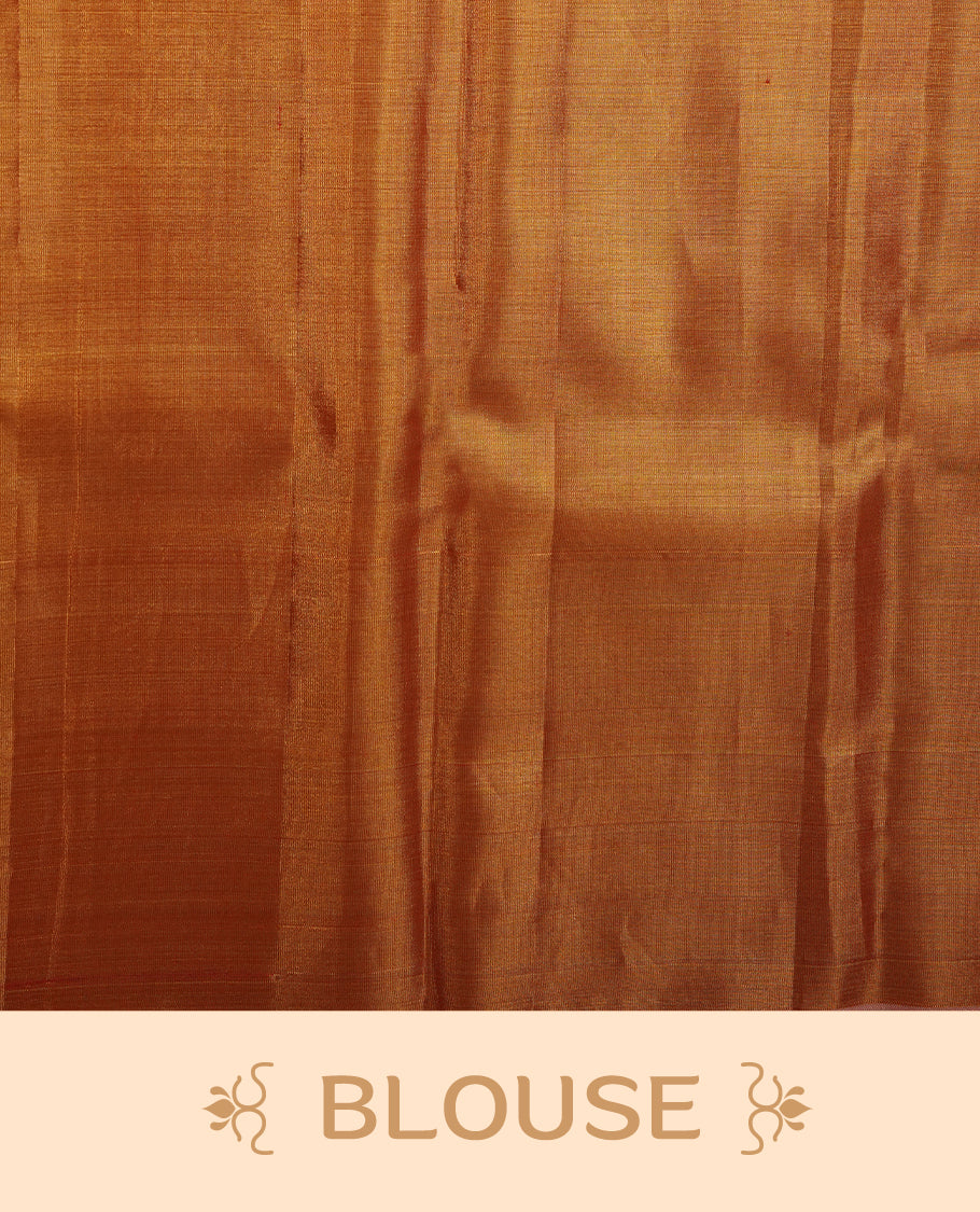 Gold colour kancheepuram tissue silk saree highlighting gold stripped zari pattern body, with contrast Pinkish beige colour colour with traditional border and paired with matching blouse.