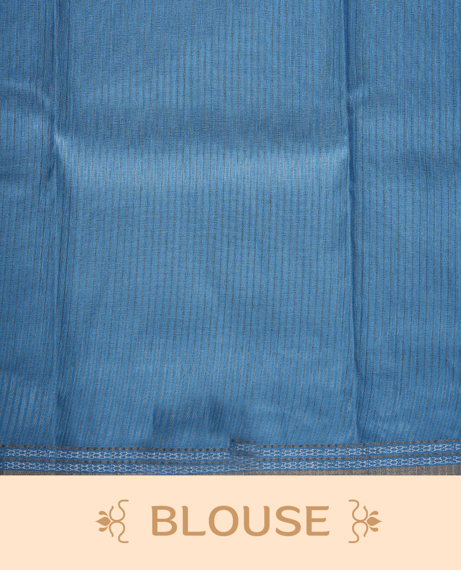 Ocean blue colour semi tussar silk saree featuring an abstract floral printed body with a rich self border and tasselled pallu, paired with a matching blouse.