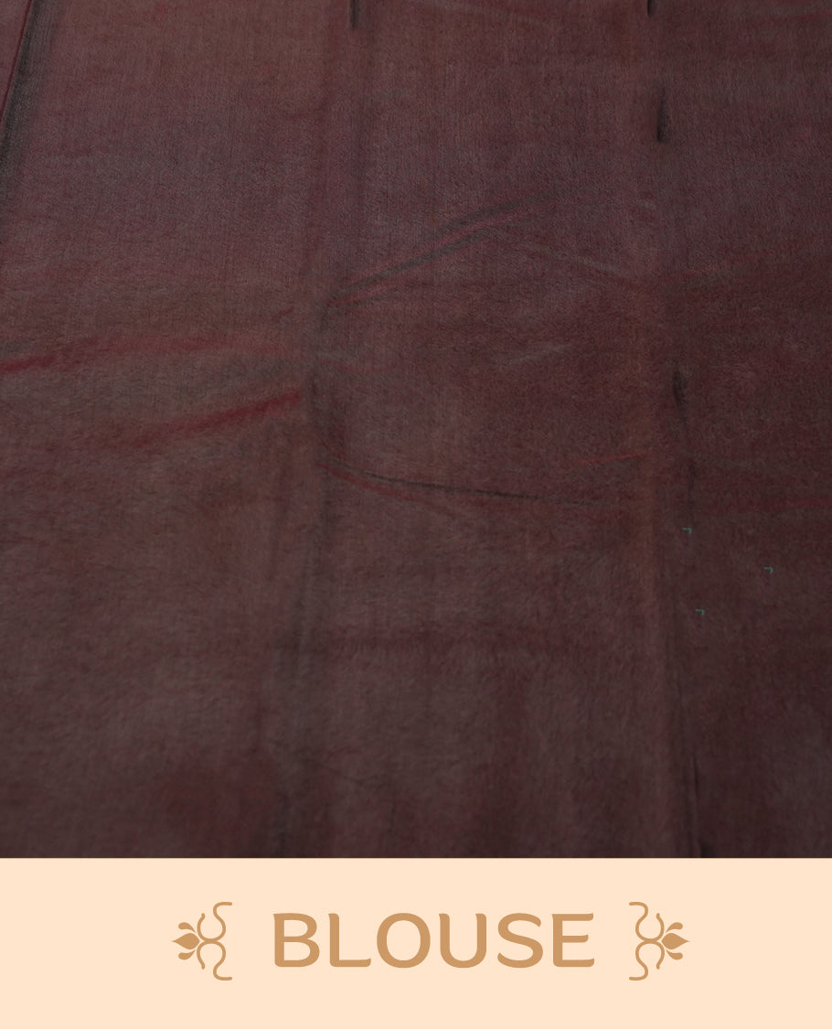 Maroon colour silk cotton saree featuring with delicate vertical copper zari lines on the body, Crafted without a border for a classy touch, Comes with a matching blouse for a perfectly coordinated look.
