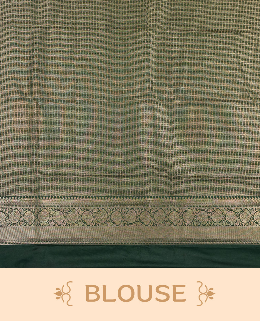 Deep Brown colour semi silk brocade saree featuring intricate Gold Floral kodi patterns across the body, complemented by a contrast rich dark green colour woven border and pallu, paired with a matching blouse.