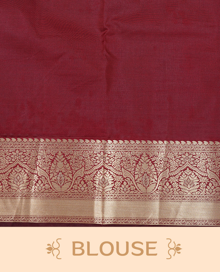 Chocolate colour semi wedding silk saree featuring Gold zari pattern on body, complemented Silver Elephant motifs & gold zari border, paired with matching blouse piece.