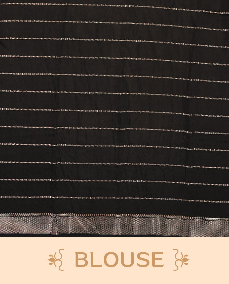 Black colour chanderi silk saree with gold zari strip pattern On body, compilmented by self colour border with antique zari pattern & white peacock print pattern and a matching blouse.
