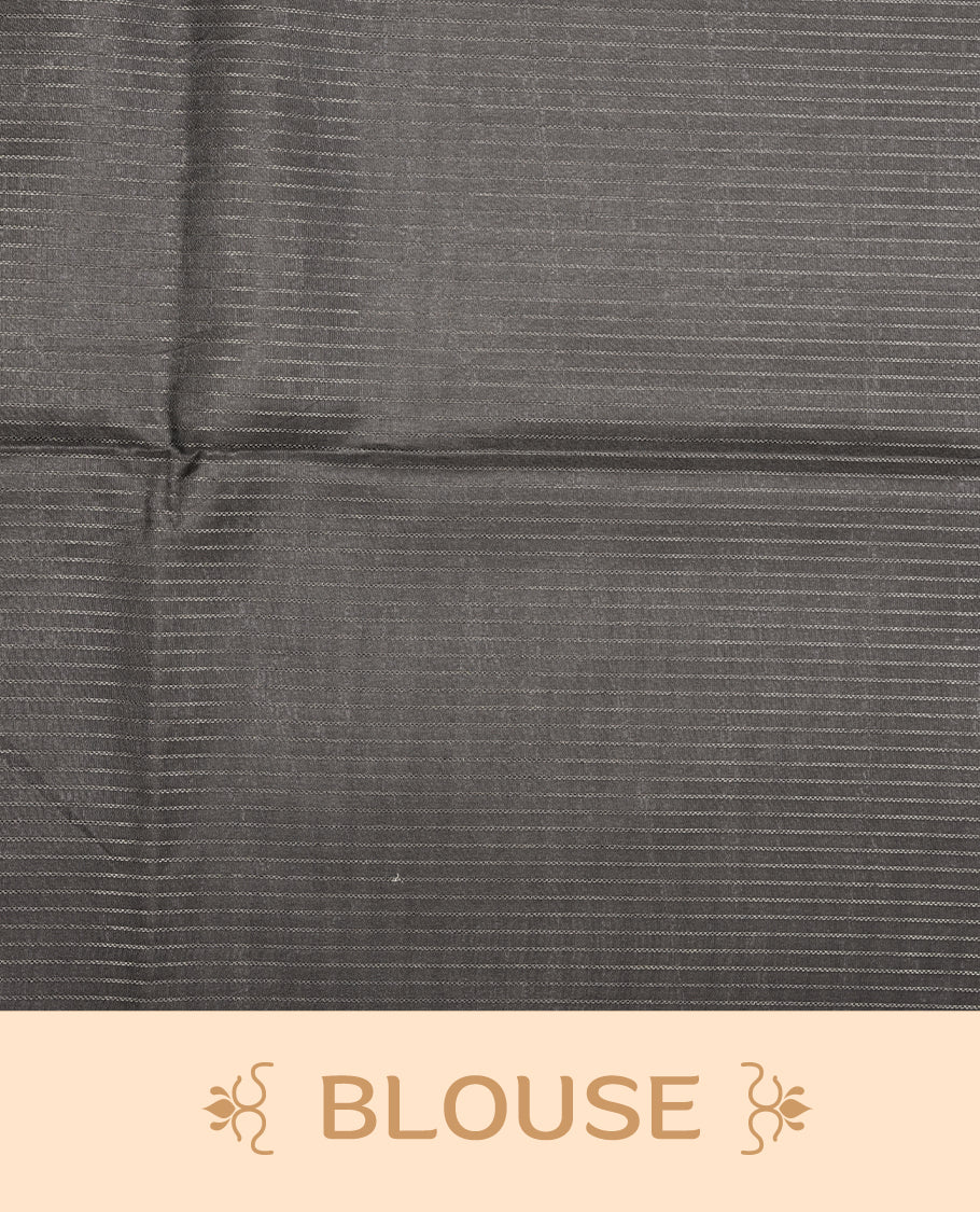 Soft charcoal grey colour semi tussar silk saree with fine striped texture and a subtle geometric body design. Finished with a classic striped pallu and tassel edges.