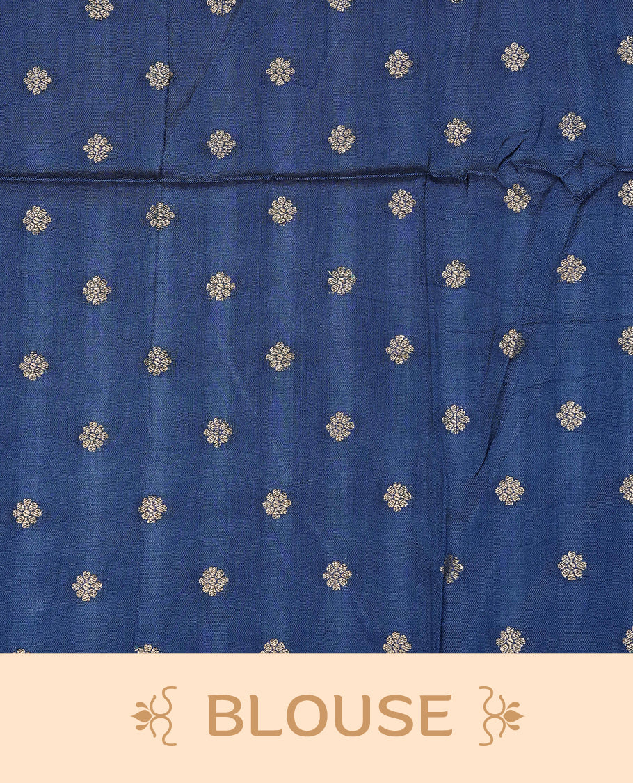 Semi Banaras Tussar Saree Featuring Gold Zari Check With Floral Pattern On Body , Teal Blue Colour With Gold Zari Border , Paired With A Matching Blouse Piece.