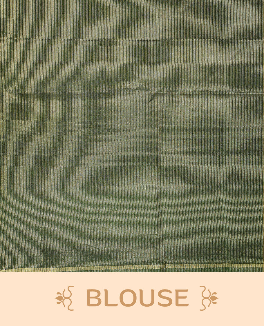 Green colour semi tussar silk saree highlights gold and silver zari stripes across body, border, pallu and paired with matching blouse piece.