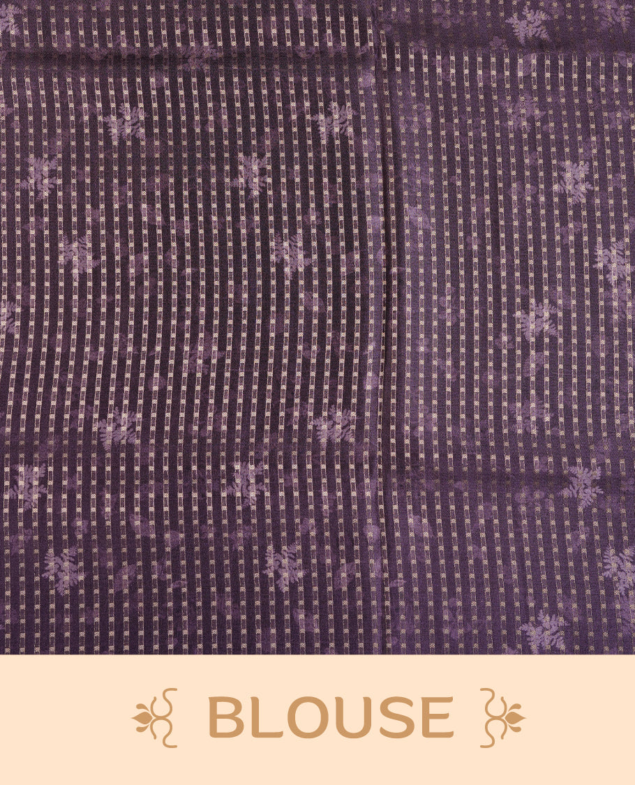 Grape colour tussar saree featuring woven Eco leaves printed on the body, complemented by a self colour gold zari bindi butta border & pallu, paired with a matching blouse.