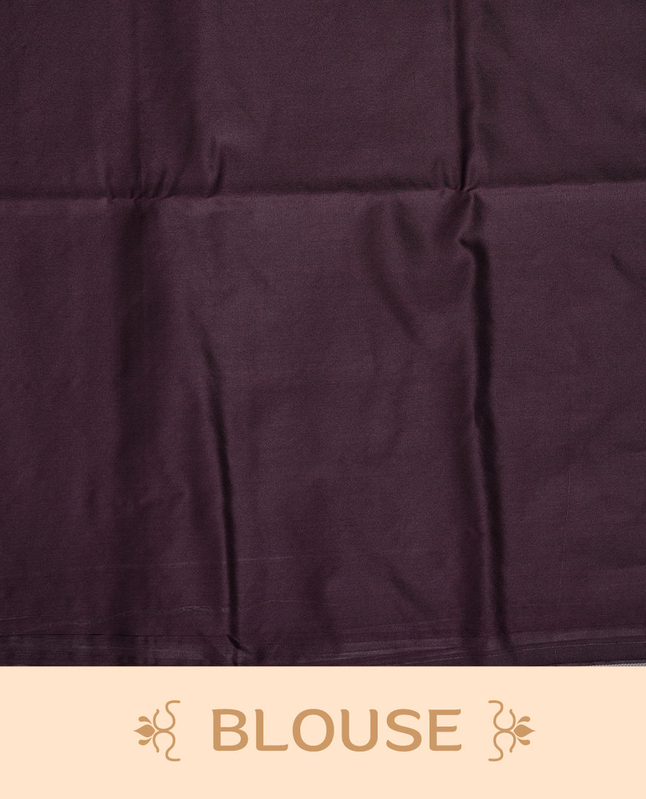Aqua green colour soft silk saree featuring Antique zari motifs on body with Highlighting contrast Dark purple colour pallu and paired with matching blouse piece.