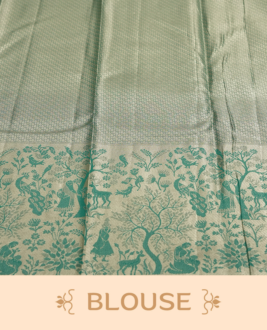 Golden colour Zari Tissue Brocade Saree features intricate tree Motifs on body and fancy border & pallu with floral patterns, paired with matching blouse