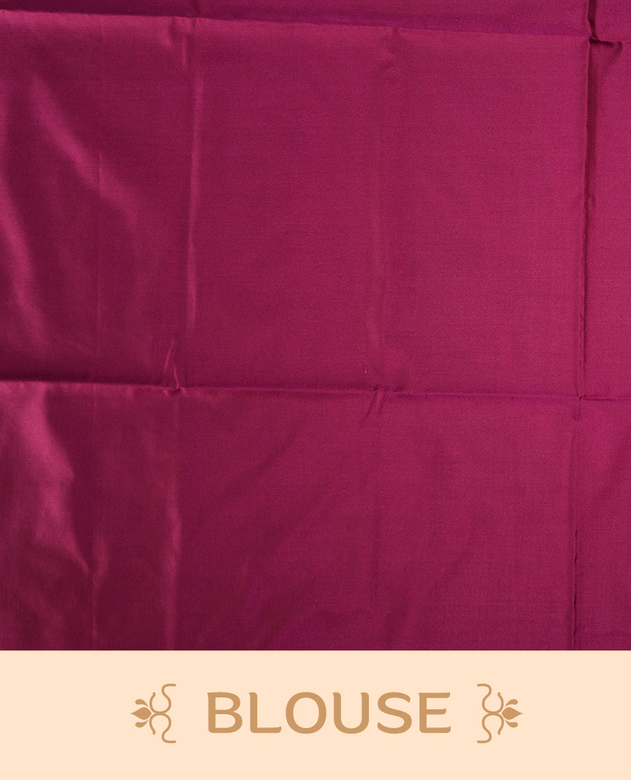 Wine colour semi soft silk saree, adorned with subtle self woven motifs on the body & The design is elevated with an elegant zari border and pallu, paired with a matching blouse.