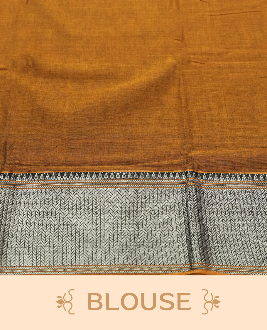 Dark mustard colour Narayanapattu cotton saree featuring a self coloured body, yellow coloured with silver zari pattern border and cream colour pallu, pairing a matching blouse piece.