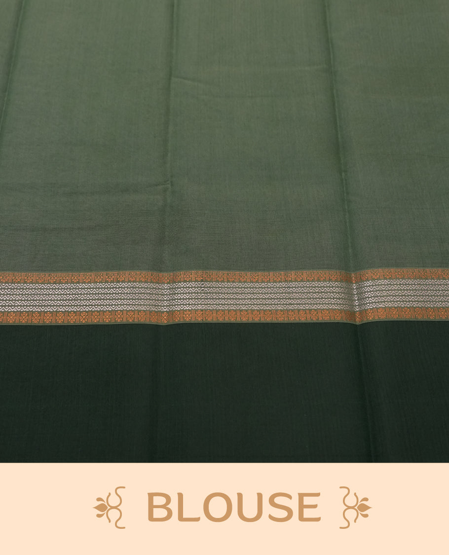 Maroon colour tissue cotton saree featuring elegant silver & copper zari motifs, a delicate zari border, and a beautifully woven pallu & Paired with a matching blouse, perfect for festive and traditional occasions.