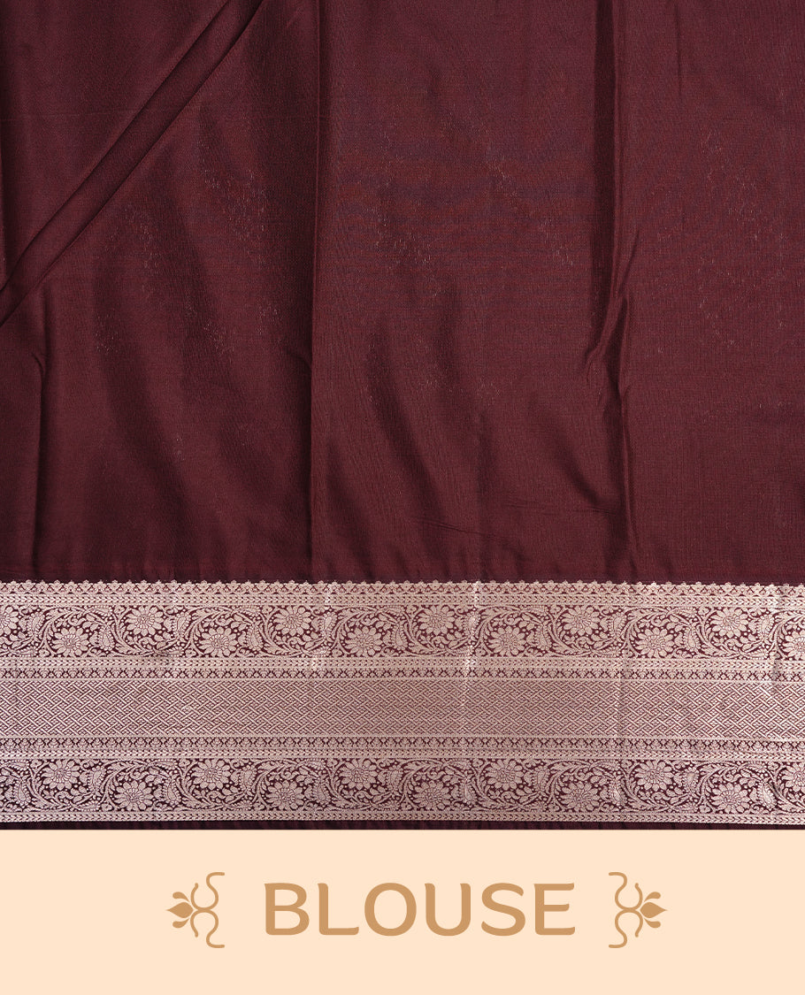 Magenta colour semi wedding saree featuring gold zari floral kodi pattern on body, complemented by contrast chocolate brown with traditional border, paired with matching blouse piece.