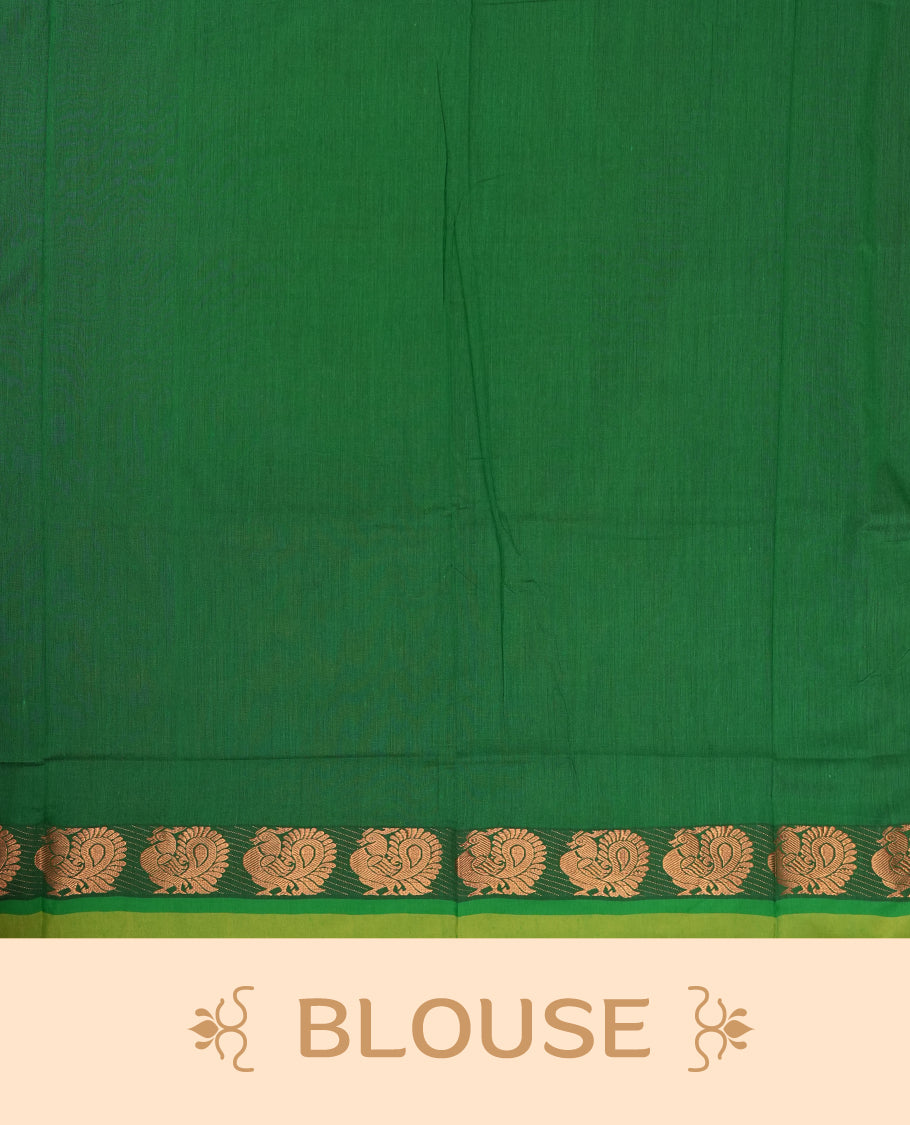 Purple colour Kalyani Cotton saree in deep green with golden peacock motifs, paired with a contrasting green border featuring intricate zari work & Comes with a matching blouse piece.