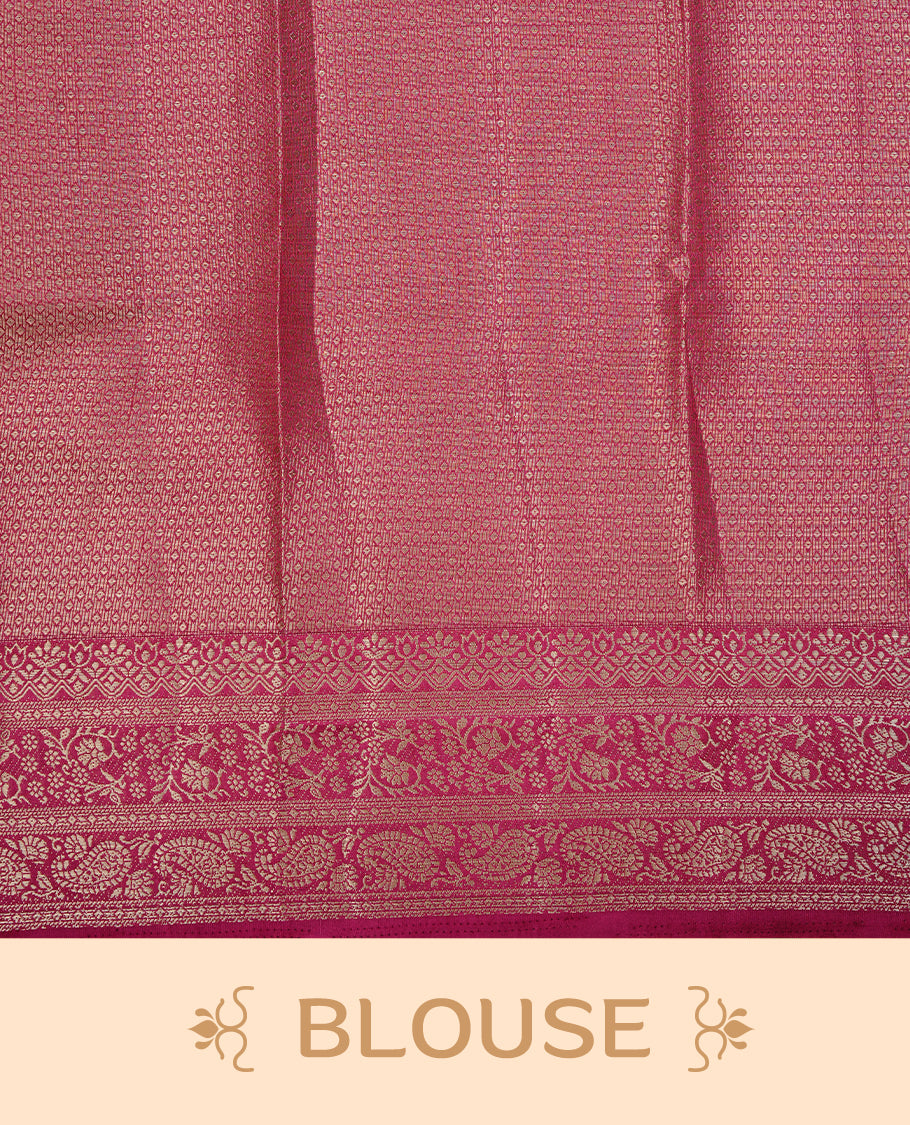 Pink colour Semi Tussar silk saree featuring an elegant plain body, accentuated by a self colour with gold traditional zari border, paired with a matching blouse piece.