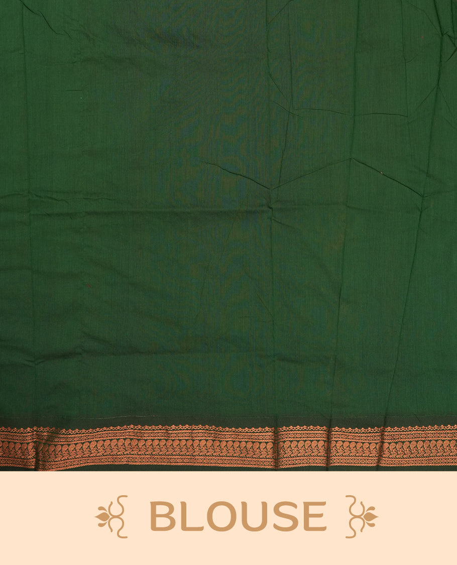 Mustard yellow colour Kalyani Cotton saree with golden motifs, paired with a contrasting green border featuring intricate peacock zari work & Comes with a matching blouse piece.