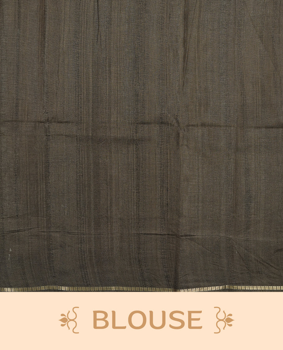 Green colour semi tusser silk saree featuring Gold zari check pattern across body, faded contrast cream colour border with elephant print and paired with matching blouse.