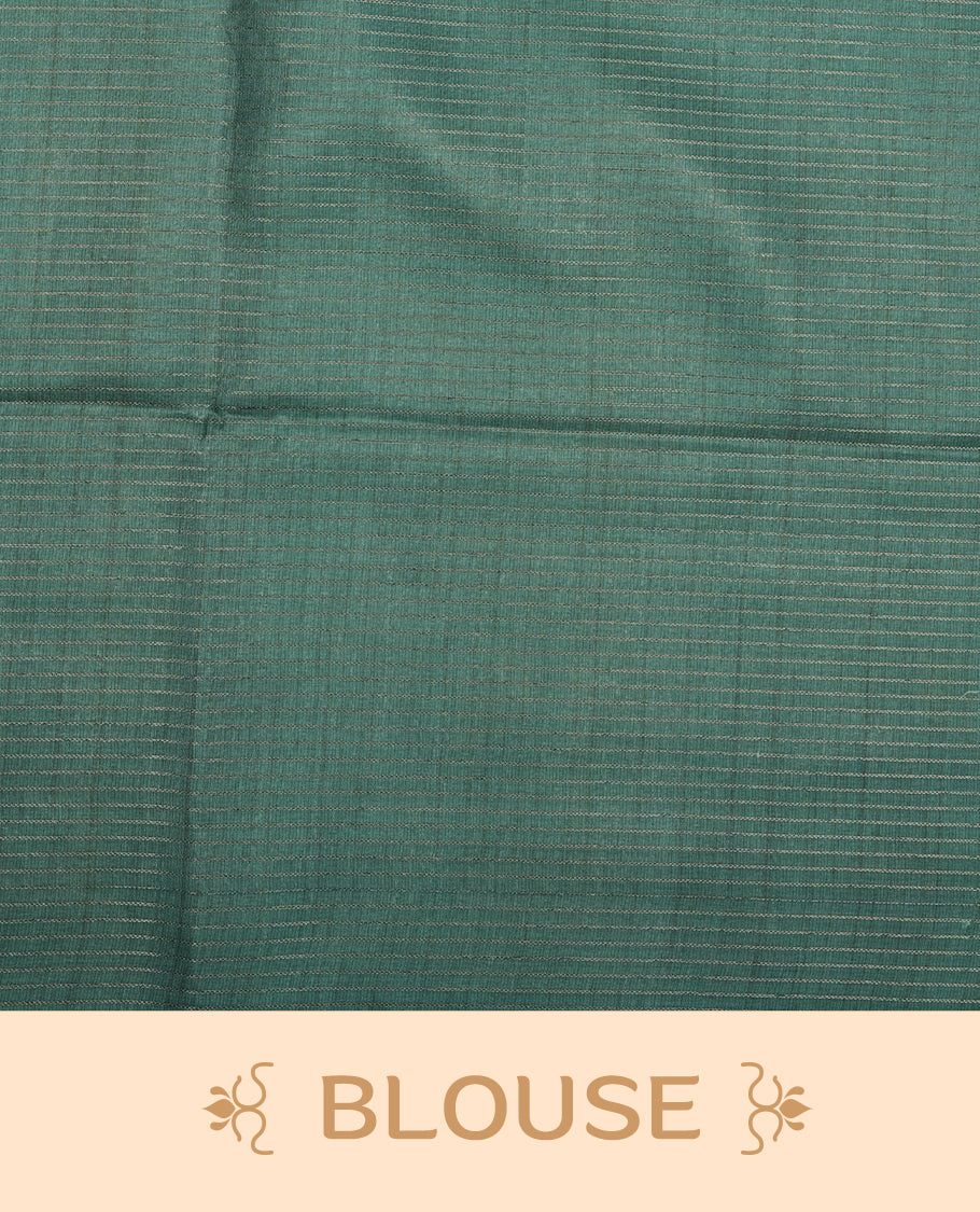Wheat colour semi tussar silk saree featuring floral print and zari check pattern across body, contrast green colour border and pallu, paired with matching blouse piece.