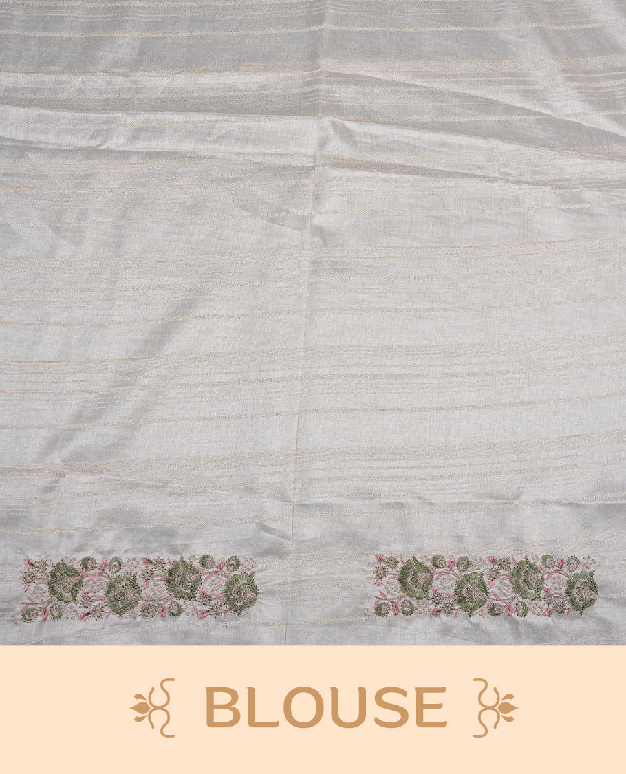 Cream colour semi tusser silk saree featuring with Green colour thread embroidery kodi pattern all over body, pallu, border and paired with matching blouse piece.