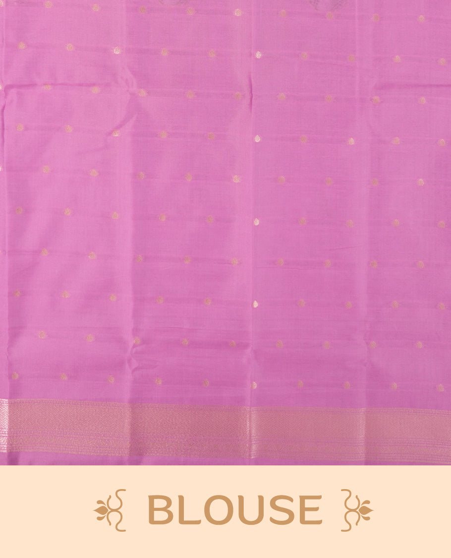 pink semi silk saree featuring elegant circular motifs on the body, complemented by a striking pallu adorned with intricate wavy white thread patterns with golden border, and paired with a matching blouse