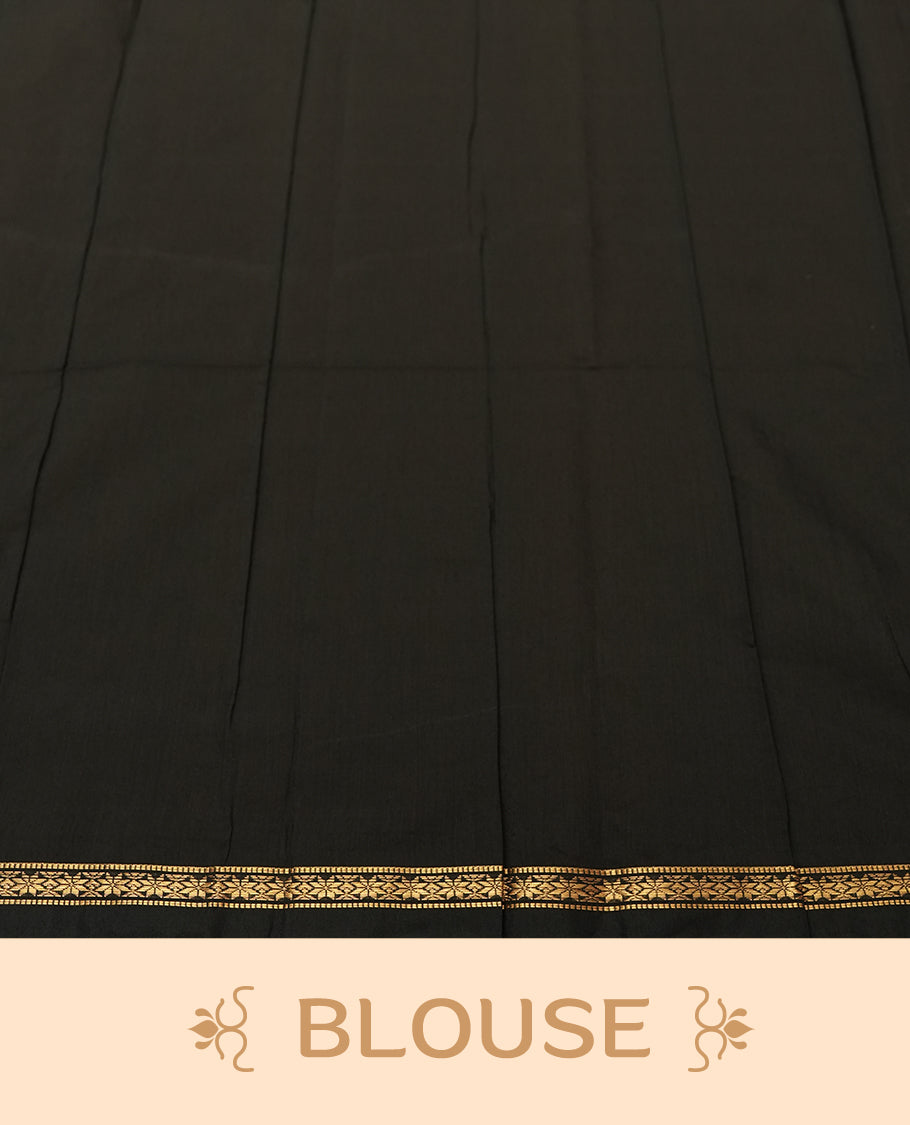 Black colour Silk Cotton Saree with Contrasting Rust Red Top Border, Antique Gold Zari Temple Border and Butta Motifs, Finished with Tassel Detailing and a Coordinated Matching Blouse Piece
