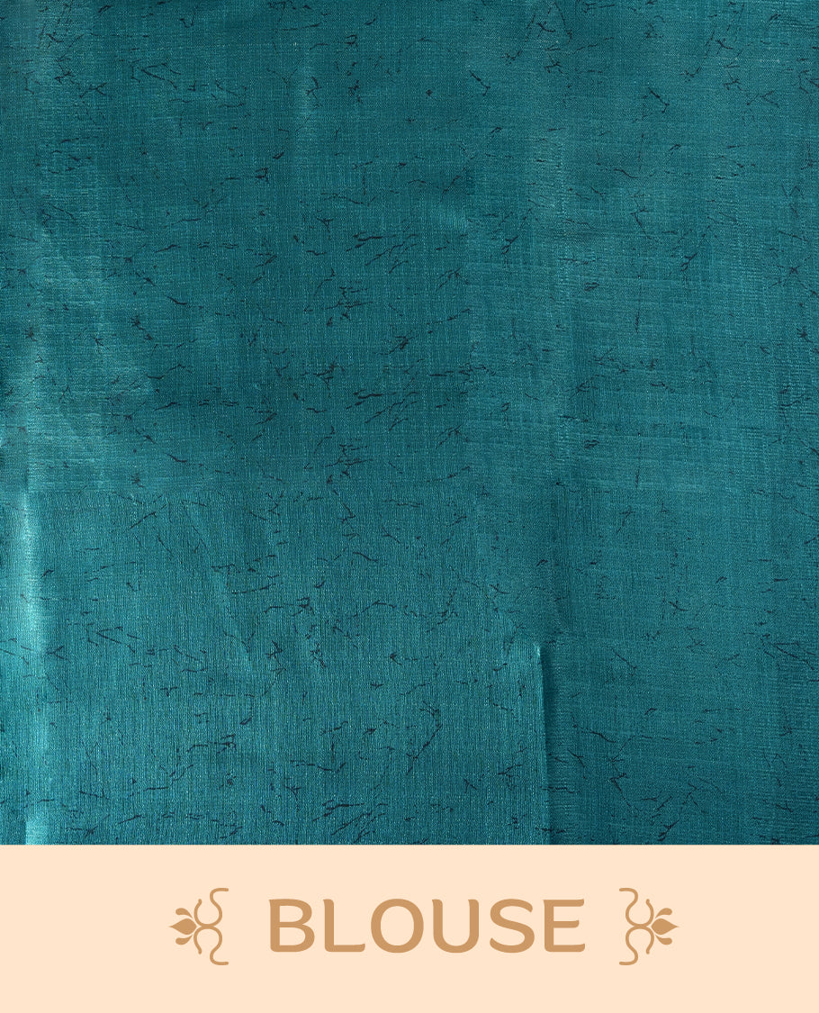 Teal blue colour saree with bold white floral motifs and subtle navy blue accents, exuding timeless elegance and modern charm, paired with a matching blouse.