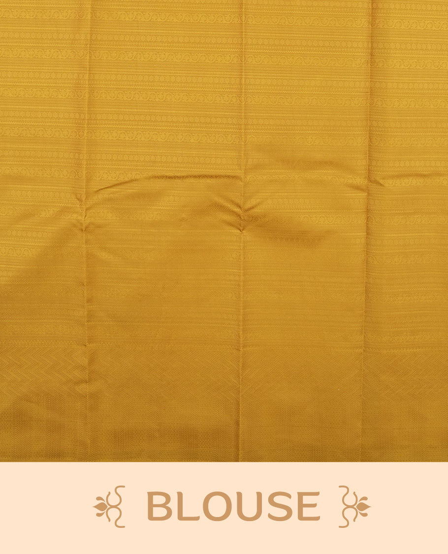 Maple colour semi soft silk saree featuring a self coloured textured patterned body, complemented by self coloured motifes on pallu & border and a matching blouse piece.
