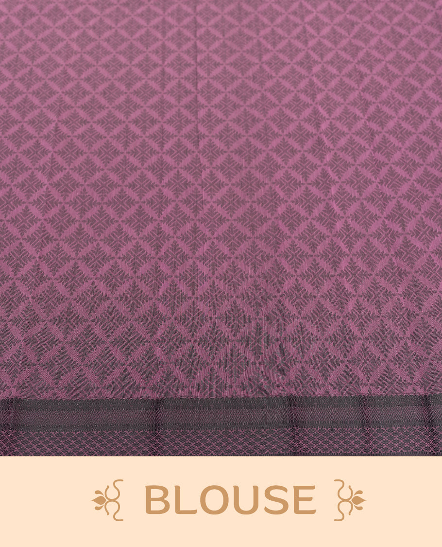Pastel purple colour silk cotton saree featuring elegant floral zari motifs on the body, complemented by a rich contrast dark border and pallu with traditional woven detailing & Comes with a matching blouse piece.