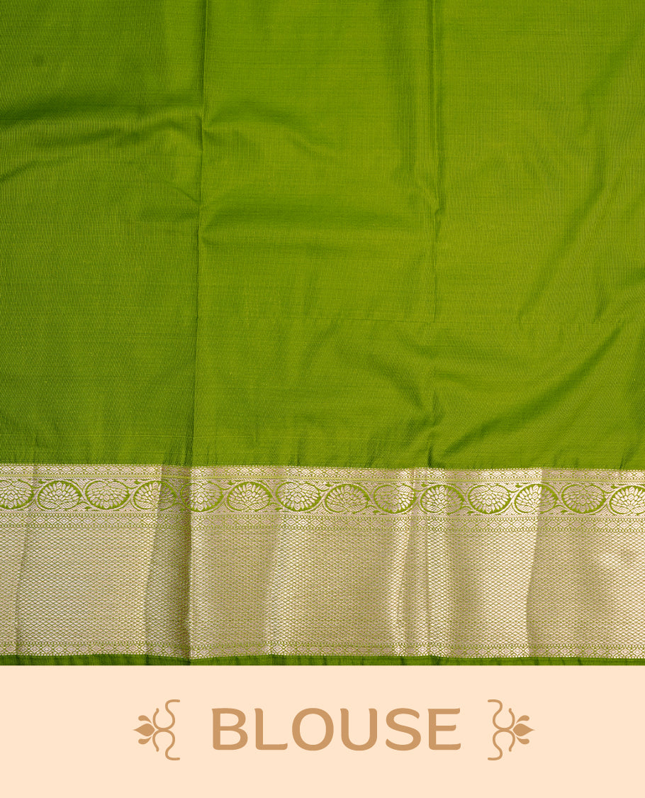 Silver colour semi wedding saree featuring silver zari floral kodi pattern on body, contrast Light green colour with traditional border, paired with matching blouse piece.