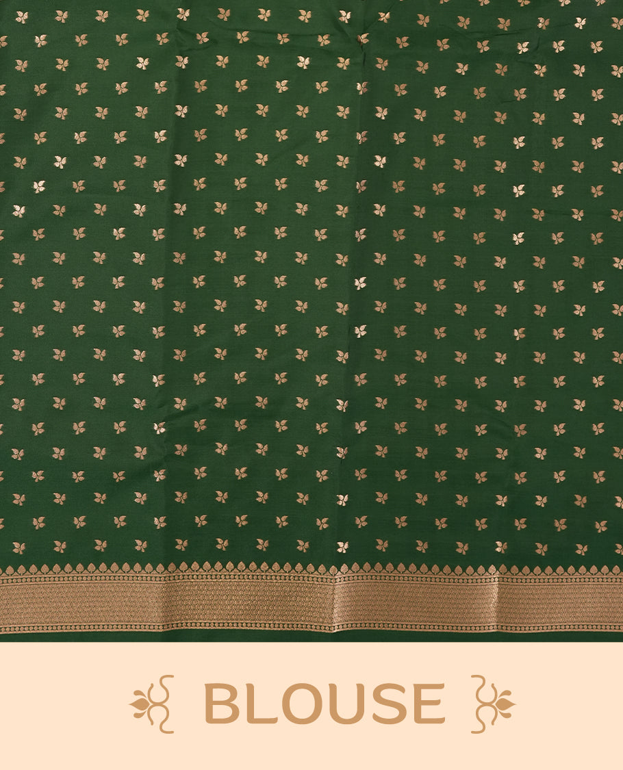 Dark green colour semi silk saree adorned with elegant floral motifs on the body, complemented by a shimmering golden zari-woven pallu and border, and paired with a matching blouse