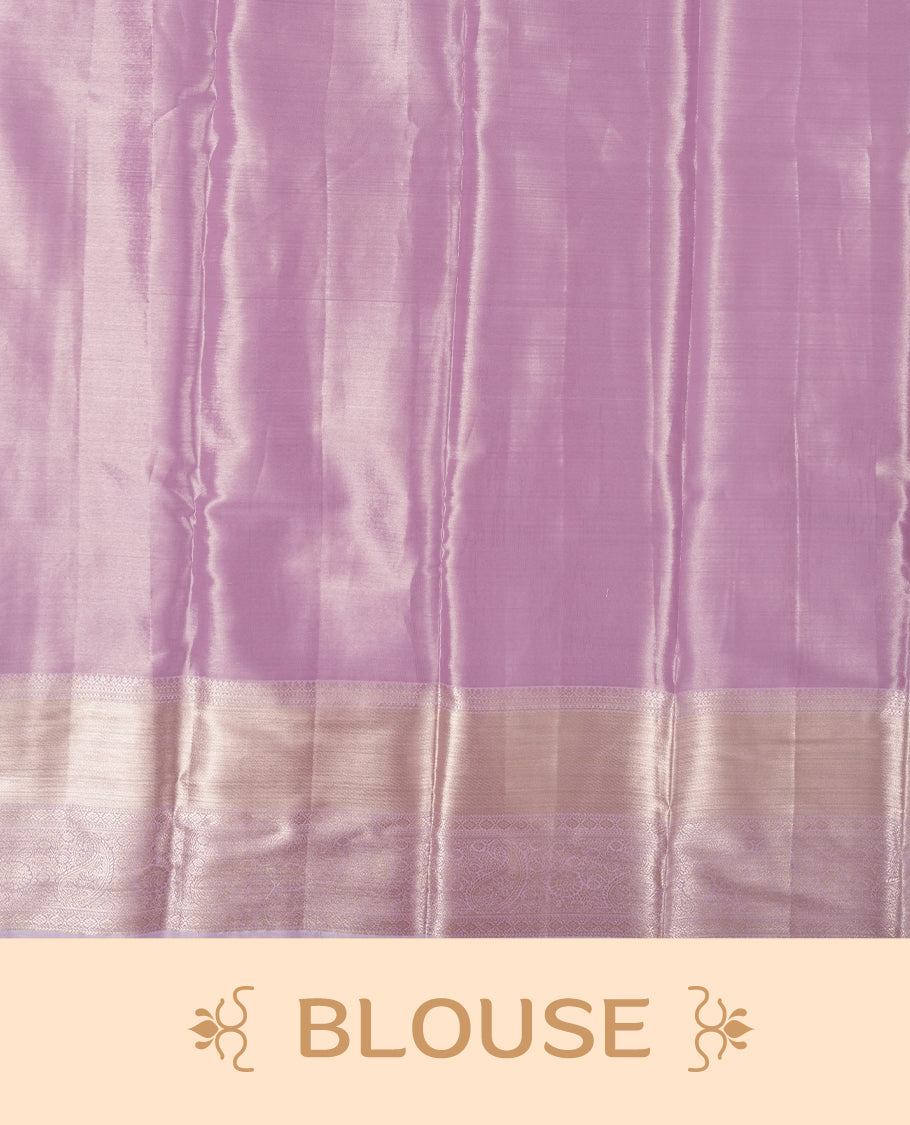 Light Lavender colour and silver Zari Tissue Brocade Saree features intricate Zigzag Motifs on body and self coloured border & pallu, paired with matching blouse