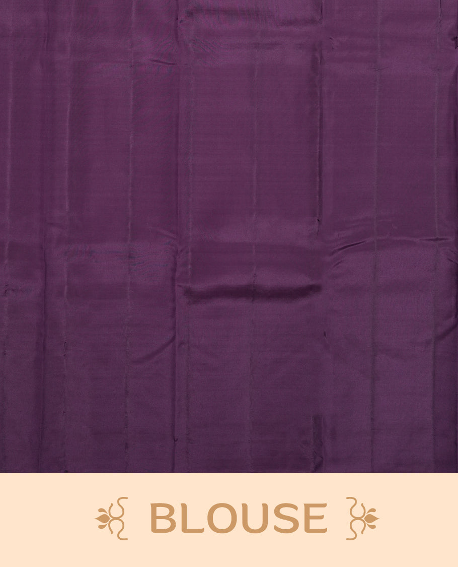 Dark purple colour semi soft silk saree featuring a self coloured textured patterned body, complemented by self coloured motifes on pallu & border and a matching blouse piece.