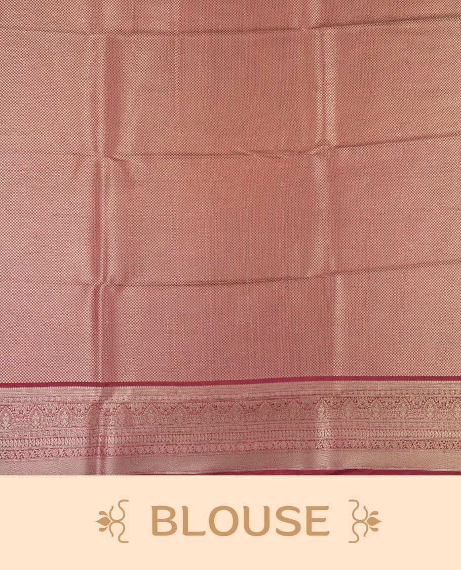 Deep brown colour semi silk brocade saree featuring intricate Gold butta patterns across the body, complemented by a rich self colour woven border and pallu, paired with a matching blouse.