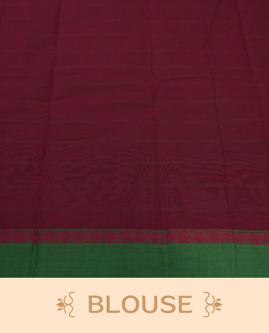 Maroon colour Pure Kanchi cotton saree with subtle green stripes and a contrasting green border & Includes a matching blouse piece for a complete look.