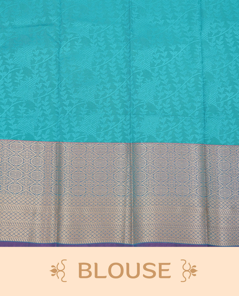 Green colour Semi silk saree Featuring Self colour zari motifs on body, complemented by contrast purple colour with gold zari border, paired with matching blouse piece.