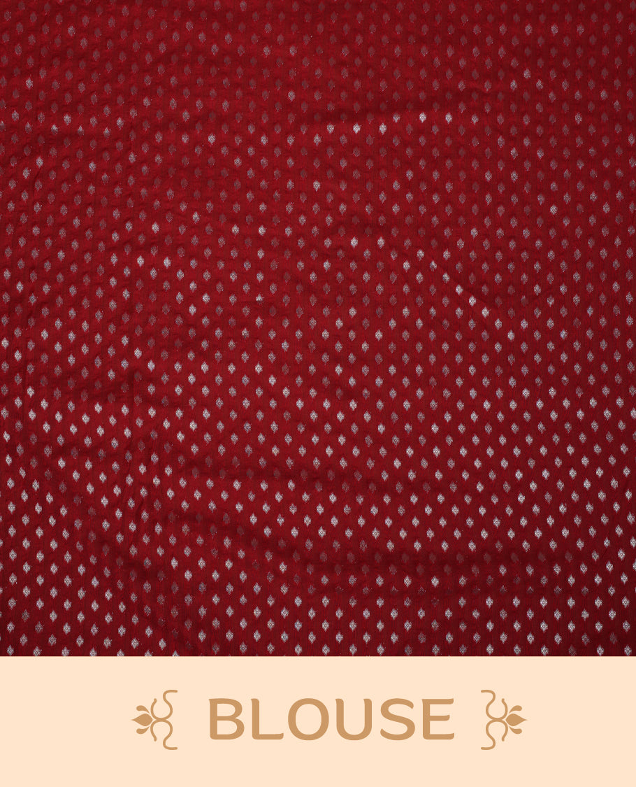 Maroon colour Banarasi silk saree featuring intricate zari weaving and a soft silk texture, Adorned with silver motifs on the body, complemented by a rich Banarasi border and pallu & Comes with a matching blouse.