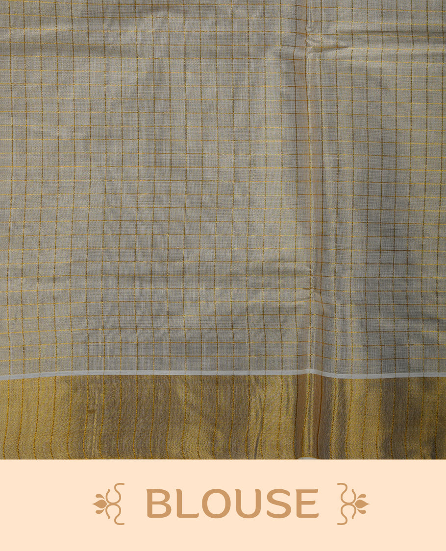 Light gold colour Tissue Kerala saree featuring a gold zari check pattern body, an intricately woven gold traditional border with floral and Indian art form print paired with a matching blouse.