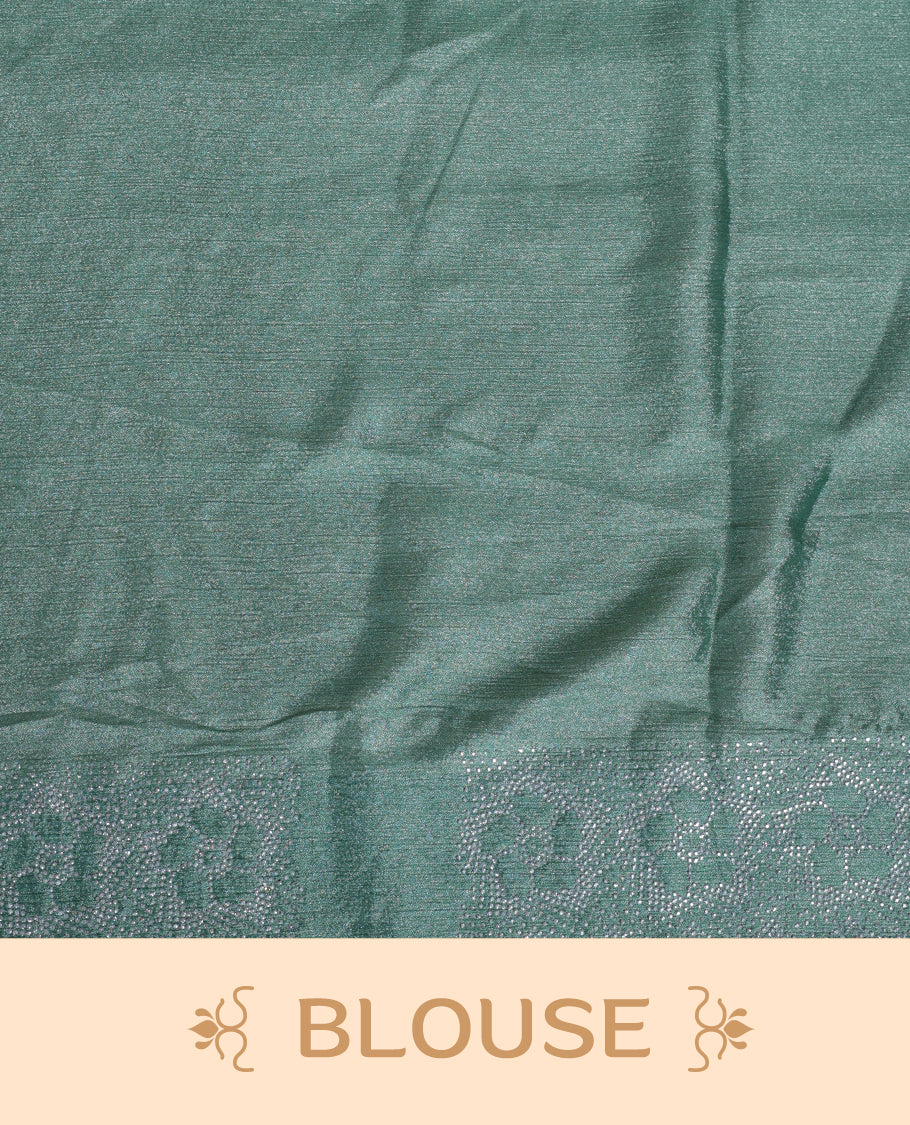 Pastel green colour shimmer designer saree, featuring white scattered stone on body, stone work and heavy stone floral pattern on border and pallu, Paired with matching blouse.