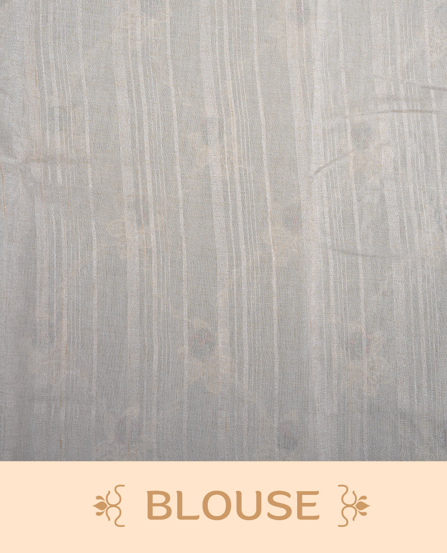 Cream colour semi tuseer silk saree featuring with Self colour thread embroidery kodi pattern & green colour floral thread motifs all over body, pallu, and paired with matching blouse piece.